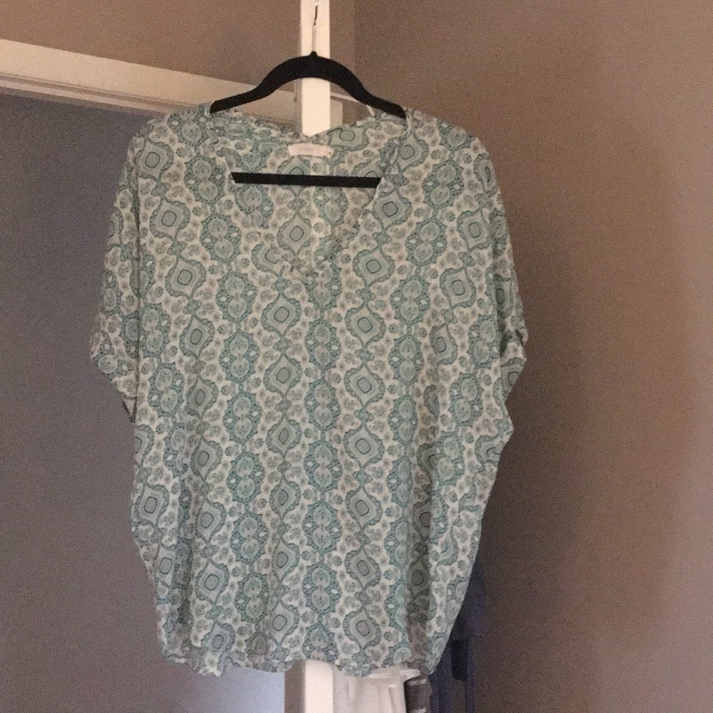 Loose fitting, v neck top.